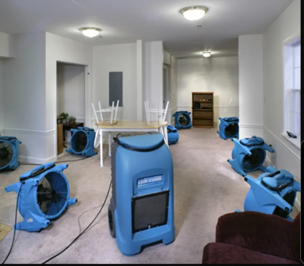 Air movers and dehumidifier setup for Water Damage Restoration in Selma